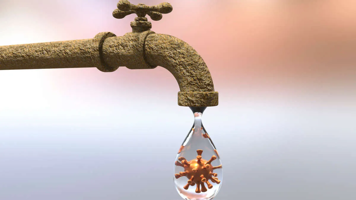 Contaminated drop of water coming out of a tap