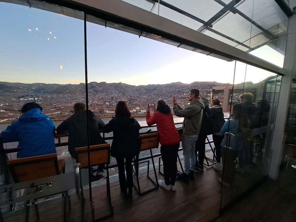 Group from walking tour taking pictures from Limbus