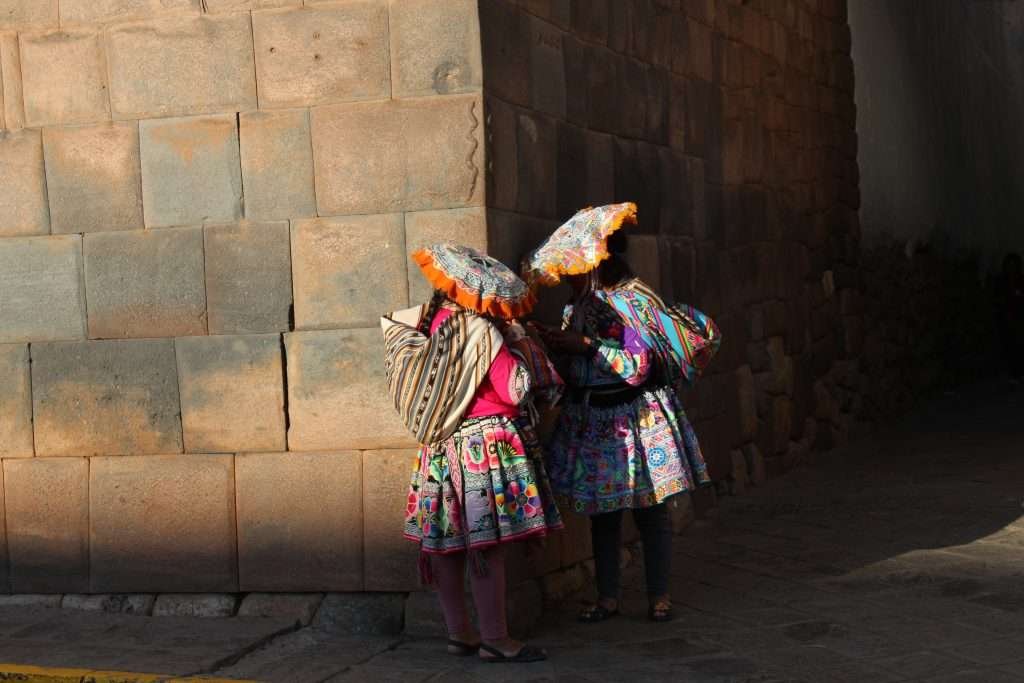 Local girls selling on traditional clothes