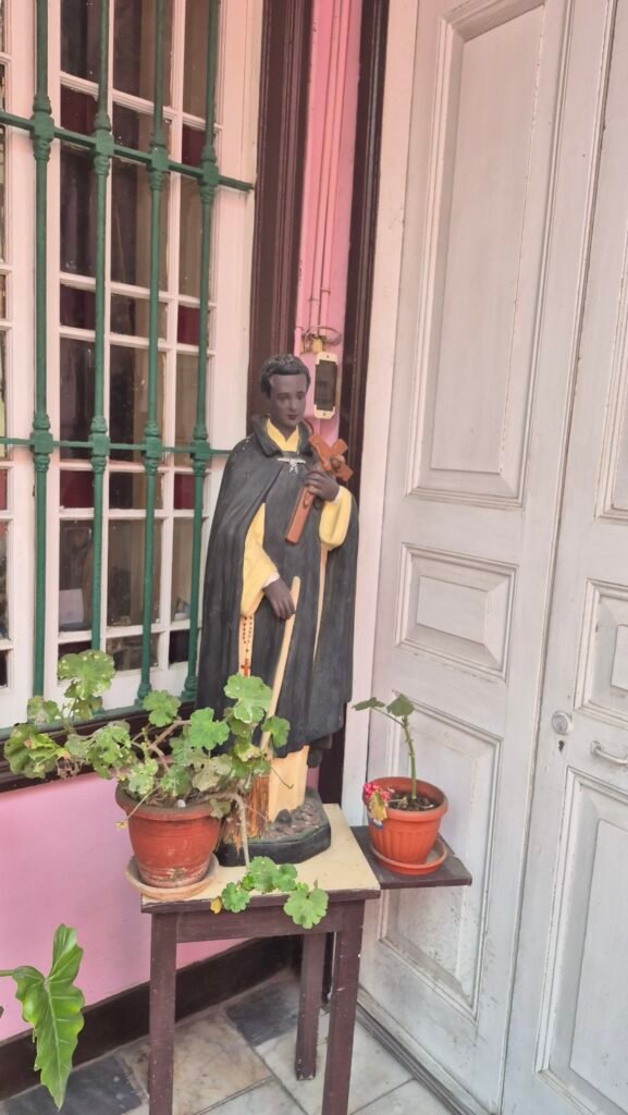 Image of San Martin de Porres inside an old house